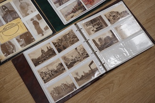 Three postcard albums containing a collection of Edwardian and later postcards, including some London scenes, London zoo, as well as other topographical scenes from Leigh-on-Sea, Whitby, Canterbury, Clacton, etc., plus s